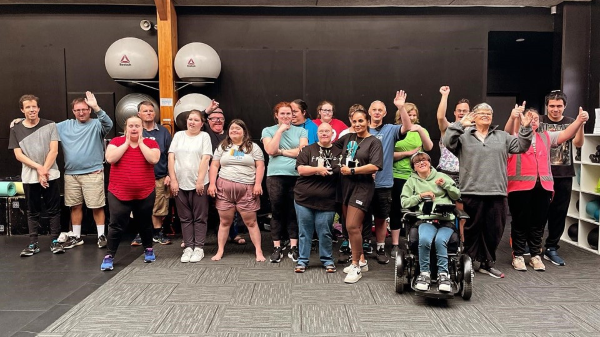 Group of people participating in adaptive fitness